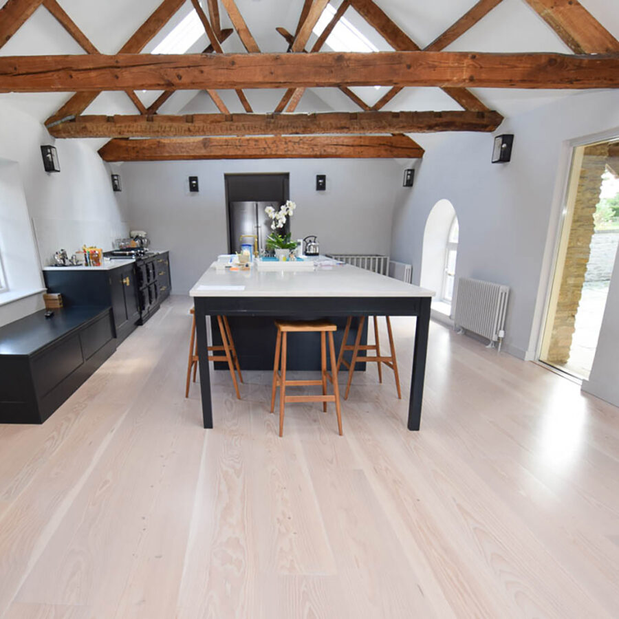 Farmhouse kitchen with Douglas Fir wood flooring with Double Linen finish