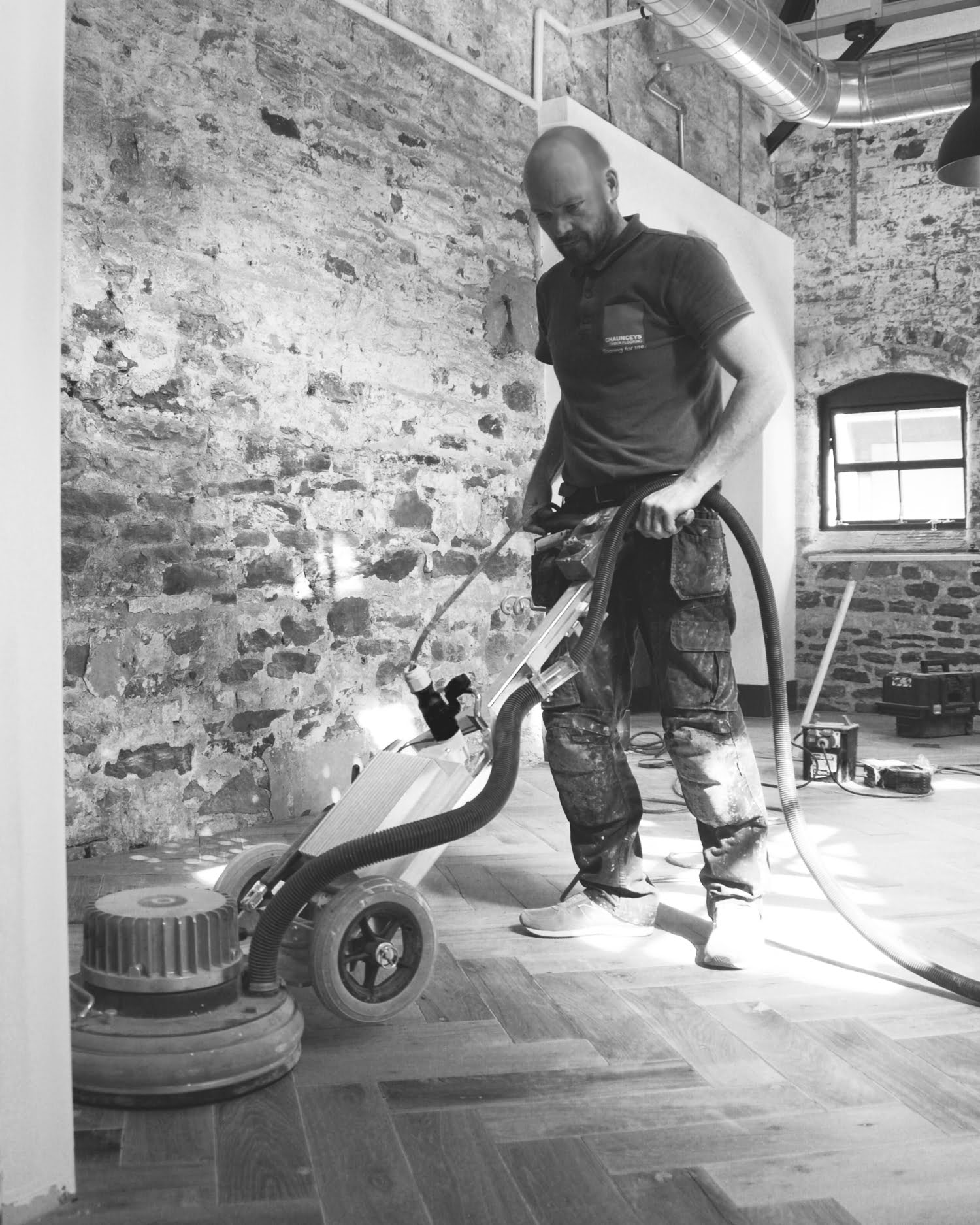 Expert floor fitter in Bristol sanding wooden floor