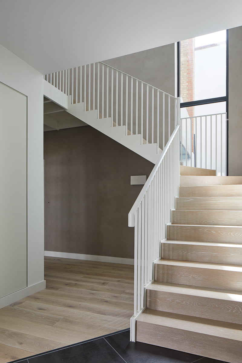 Dream White engineered oak planks on staircase at Pont Mews project