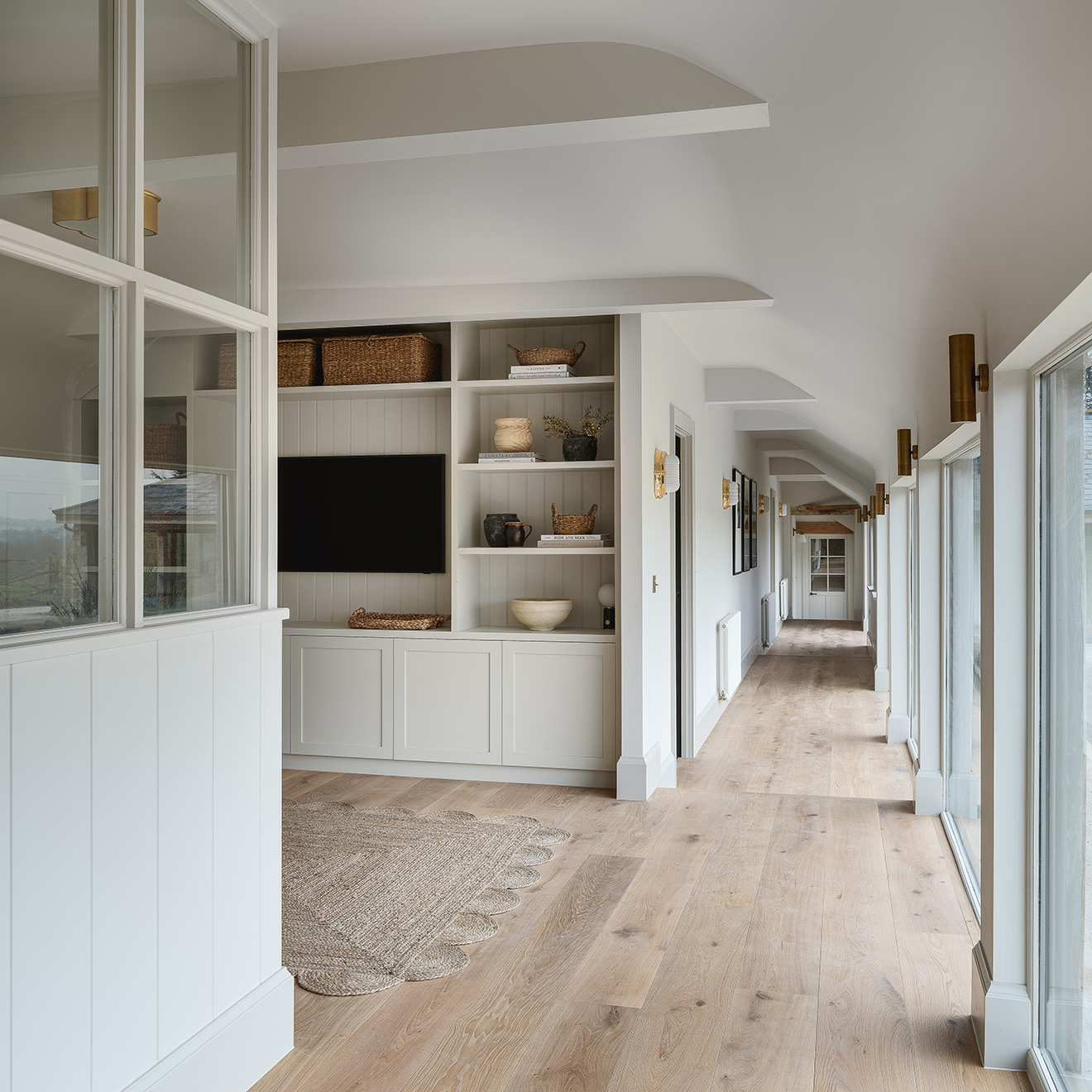 Light brushed oak flooring with Milky Coffee finish at Sussex Barn project