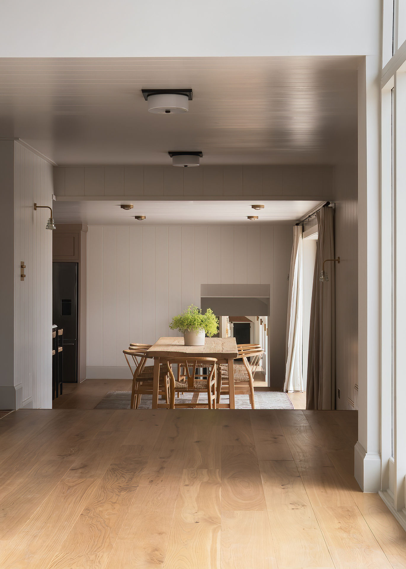 Light brushed oak flooring with Milky Coffee finish at Sussex Barn project