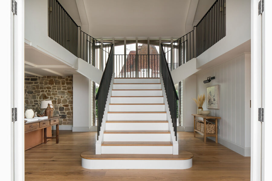 Light brushed oak flooring and stairs with Milky Coffee finish at Sussex Barn project