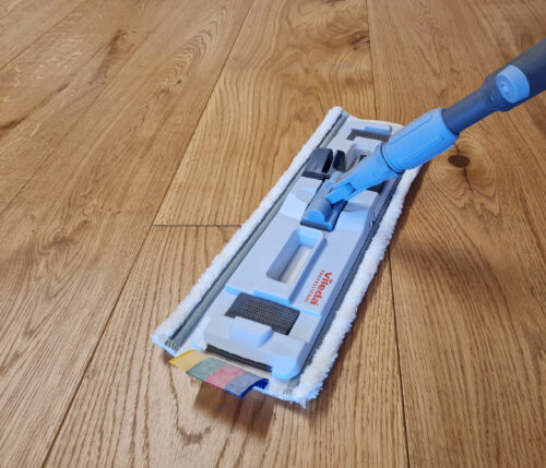 Using a Vileda mop to sweep wood flooring