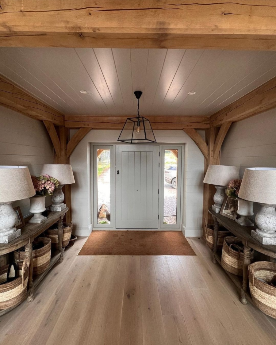 Light brushed engineered oak flooring at oak framed new-build home