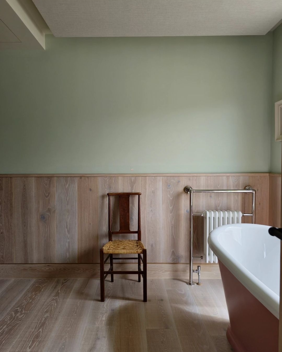 Sawn and Brushed light oak flooring in master bathroom suite