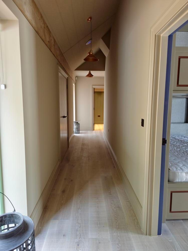 Sawn and Brushed light oak flooring in hallway